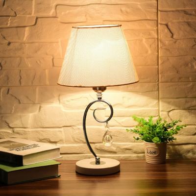 China Warm modern creative wedding room study living room decoration bedside bedroom lamp simple table cloth warm nursing cloth led table lamp for sale