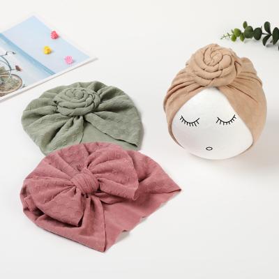 China Casual Extra Large Pour Over Reusable Hair Cap Bow Knot Bath Hair Caps With Polyester For Women And Baby for sale