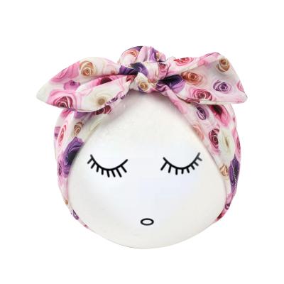 China Casual Newborn Toddler Cotton Bow Turban Kids Print Flower Headband Headwrap Infant Kids Beanies for sale