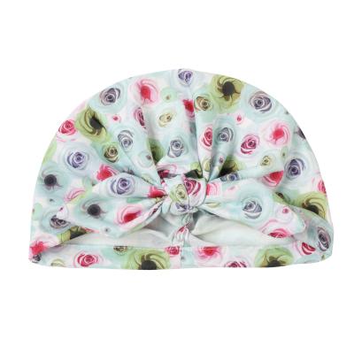 China Casual European and American children's knotted hat baby printing multifunctional bowknot hat baby sleeve cap for sale