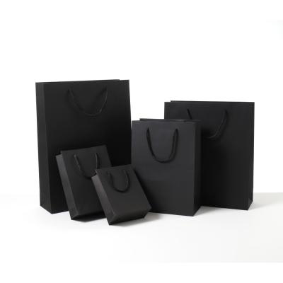 China 2021 Recyclable Popular Eco-Friendly Paper Bags With Your Own Logo Black Recyclable Paper Gift Shopping Bag for sale