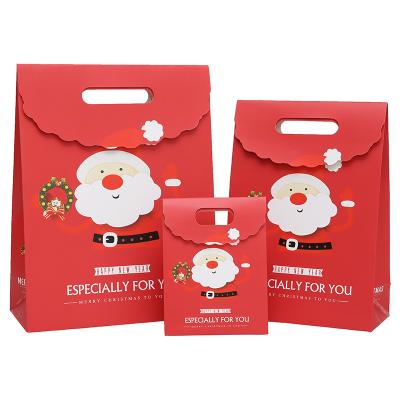 China Recyclable Merry Christmas Gift Bag Santa Claus Paper Bag Gift Christmas Decorations For Kids Home Favors Gifts Bag for sale