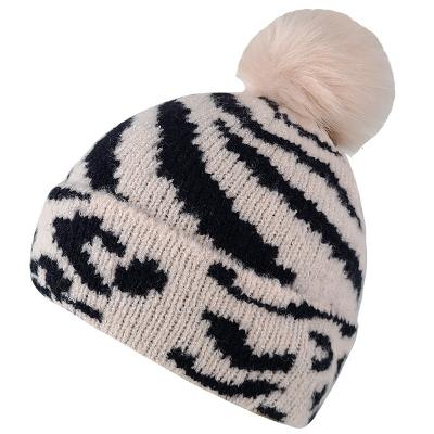 China JOINT Girl's Acrylic Knitted Beanie Hat With Faux Fur Pompom for sale