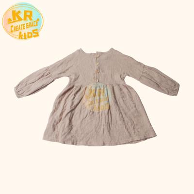 China Anti-Wrinkle Comfy Long Sleeve Dress Canvas Girl's Stylish Casual Wear Fall Down Kids Canvas Clothing With Buckle for sale