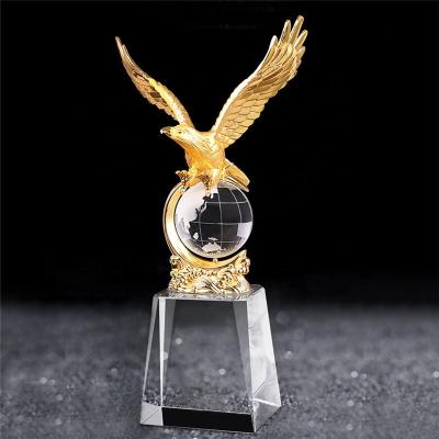 China Custom Metal Eagle Sculpture Gold Europe Trophy with Crystal World Globe Award Trophy for Business Gifts Souvenirs for sale