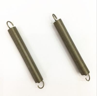 China Coil Cardboard Tension Spring Steel Return Spring for sale