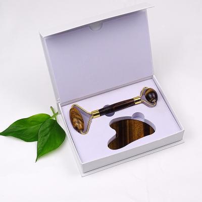 China Wholesale Brown Jade Roller For Face Jade Quartz Facial Massager Tiger Eye Face Lift Massager Tool for sale