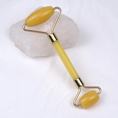 China Face Lift Tightening Aventurine Massager Yellow Stone Skin Tightening Jade Facial Roller Gua Sha for sale