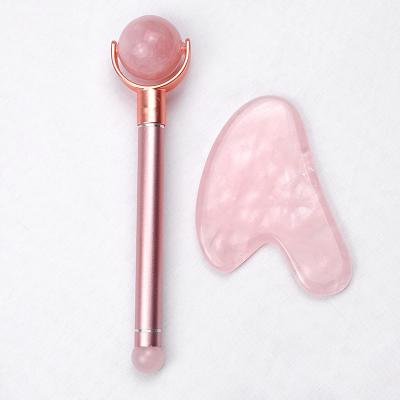 China Pure Natural Pink Crystal Roller Massager Face Lift Jade Quartz Jade Roller Facial Pink Guasha Kit for sale