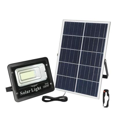 China 100W Solar Flood Light Super Bright Waterproof Indoor Solar Outdoor Household Garden Light Easy Installation New and Rural Outdoor for sale