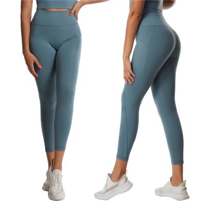 China 2022 Antibacterial Women's Sportswear Yoga Gaiters Fitness Gym High Waist Yoga Pants Leggings With Pockets for sale