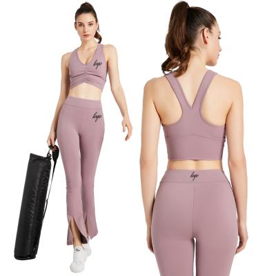 China Breathable Wholesale Nylon Spandex Fitness Clothes Yoga Set Butt Lift Activewear Fits Bootcut Flared Pant Gaiters Set For Women for sale