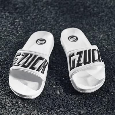 China Custom 2021 Soft Anti-Smell Fashion Boy Designer Logo Slippers Slippers Shoes Embossed Printed Slides For Men for sale