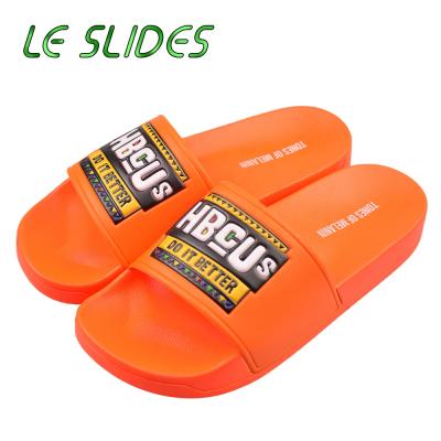 China Custom 3D Anti-Smell Embossed Slide Slippers Custom Logo Hotel House Slippers Custom Logo for sale