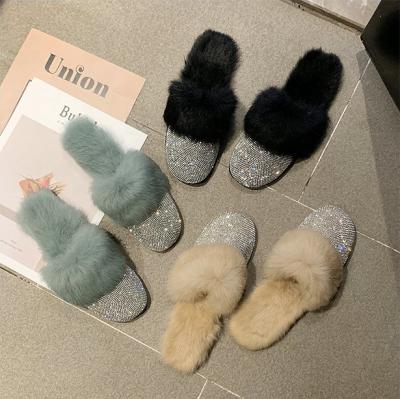 China 2021 Hot Sale Shiny Fur CUSHIONING Slips Bling Rhinestone Fluffy Housekeeper Slippers For Ladies Sandals for sale