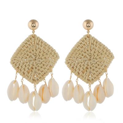 China Hot Romantic Ethnic Style Rattan Conch Wind Ocean New Product Handmade Amazon Tassel Earrings for sale