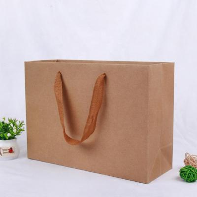 China Logo Printed Luxury Biodegradable Custom Paper Bags Retail Clothing Packaging Packaging Shopping Paper Bag For Clothes for sale