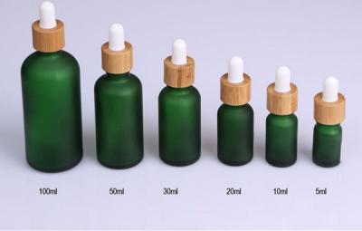 China frosted green glass cosmetic dropper bottle 5ml 10ml 15ml 20ml 30ml 50ml 100ml cosmetic bamboo pump packaging for sale