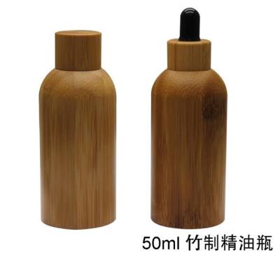 China Luxury 50ml  natural bamboo lid cosmetic packaging  dropper glass bottle for sale