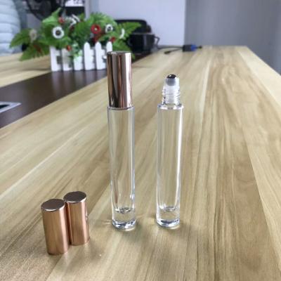 China Wholesale low MOQ 10ml amber thick wall glass roll on bottle eye cream roller ball bottle glass perfume for sale