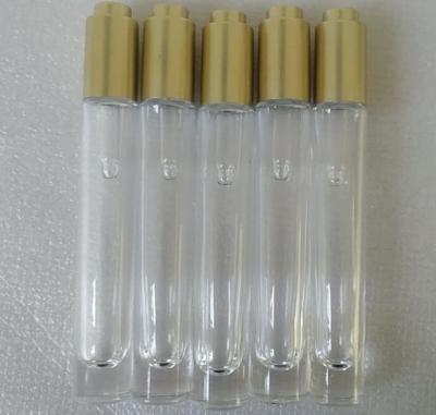 China transparent empty 10ml glass dropper bottle with gold pump press for sale