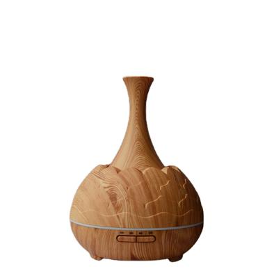 China 400ml Healthy Daily Aroma Essential Oil Diffuser Moisturize Ultrasonic Air Humidifier with Wood Grain Aroma Diffuser for sale