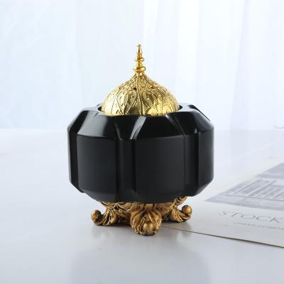 China 2022 New Hot Metal Gold Ceramic Portable Elegant Luxury Incense Burner Middle East Mabkhara Hard Incense Holder for sale