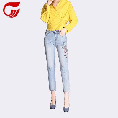 China Color Fade Proof Royal Blue Coating Design Women Slim Leg Embroidery Boot Cut Out Jeans for sale