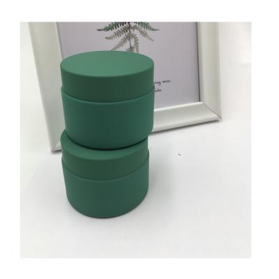 China Carre Cream Lastest Style Soft Touch Skin Packing Green Glass Cosmetic Cream Jar for sale