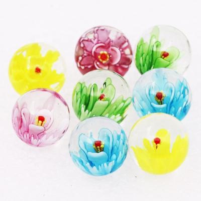 China Mix Toys 16mm Round Custom Murano 3D Flower Toy Glass Marble for sale