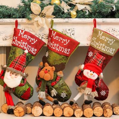 China Party Decoration Artificial Leather Leg Socks Santa Claus Snowman Elk Candy Bag Gift Bag British Christmas Stocking New Long for sale