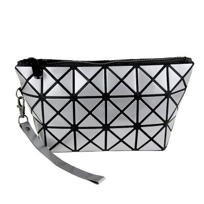 China Fashion Solid Color Deformable Mini Clutch Geometric Cosmetic Bags For Women for sale