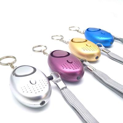 China Elderly Women Self-Defense Children Kids Security Alarm 140DB Key Chain Self-Defense Keychains With LED Flashlight for sale