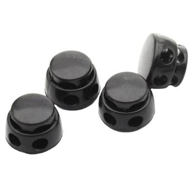 China Big Black Plastic Plugs Round Ball Rope Lock Toggles 2 Hole Plugs 5mm Bungee Shock Rope for sale