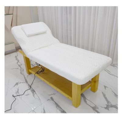 China Comfortable high quality multifunctional solid wood latex mat with motor beauty electric spa repair massage puerperal bed for sale