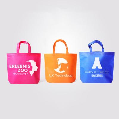 China Recyclable colorful reusable shopping bags handles non woven fabric fabric bag for gifts grocery stores sell events parties take away for sale