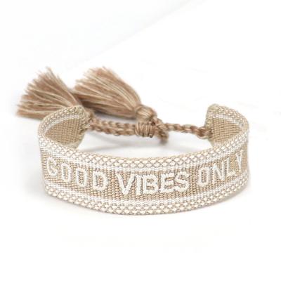 China Business Embroidered Letter Woven Adjustable Tassel Logo Bracelet for sale