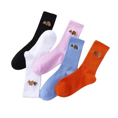 China QUICK DRY high quality simple embroidery women socks custom cartoon polar bear logo for sale