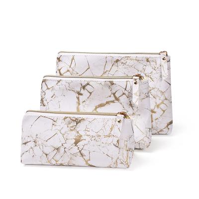 China New gold marble printed travel cosmetic bags elegant pu leather square makeup bags custom logo wholesale Te koop