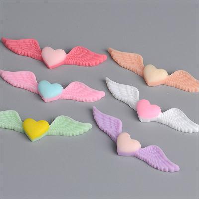 China Cabochon For Eco-Freiendly Decoration Accessories Mix Color Resin Double Wing Setting Empty Wing Flatback Cabochon for sale