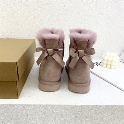 China Snowboot snow rejects women's wool single all-in-one simple ribbon bow short hair boots winter the sole for sale