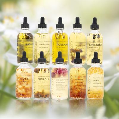 China Skin Revitalizer Skin Packing Natural Organic Aromatherapy Skin Whitening Body Massage Oil Hair Oil Rose Petals Face Oil for sale