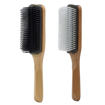 China 2021 new salon sea ribs plastic hair comb brush with wooden handle for home salon use for sale