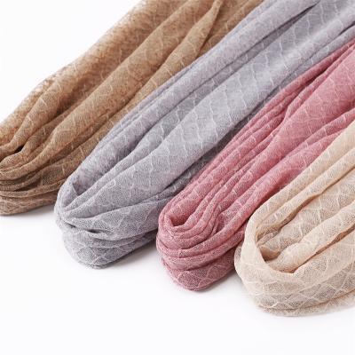 China Long New 2022 Solid Color Stretchy Beautiful Breathable Plaid Ribbed Hijab Shawl Lace Cavity Polyester Muslim Head Scarf for sale