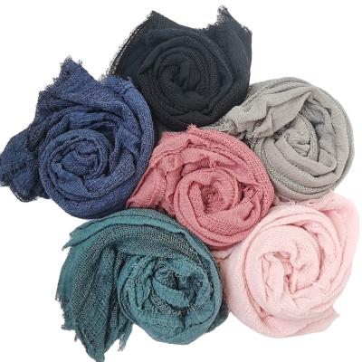 China Large Size Simple Bubble Cotton Stretch Scarf Hollow Out Mesh Soft Elastic Muslim Hijab Headscarf Wraps Shawls for sale