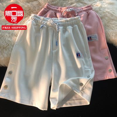 China Breathable Casual Loose High Waist Couples Shorts Summer 2021 Men And Women Design Sports Shorts Breasted New for sale