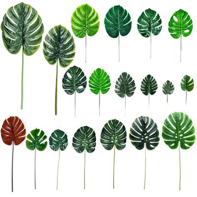 China Europe Green Monstera Artificial Palm Leaves Tropical Faux Leaves for Safari Jungle Hawaiian Luau Party Decoration for sale