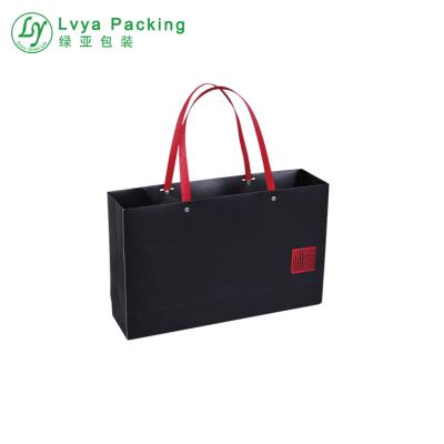 China Luxury Black Recyclable Custom Logo Card Panel Art Paper Bag Cardboard Paper Gift Bag With Handles for sale