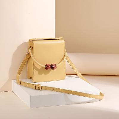 China Fasion new fashion bag vertical high quality messenger bag mini small pearl mobile phone bag for sale