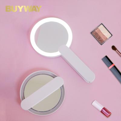 China Minimalist Travel Size Handle On Switch Vanity Compact Small Mini Handheld Led Mirror Makeup for sale